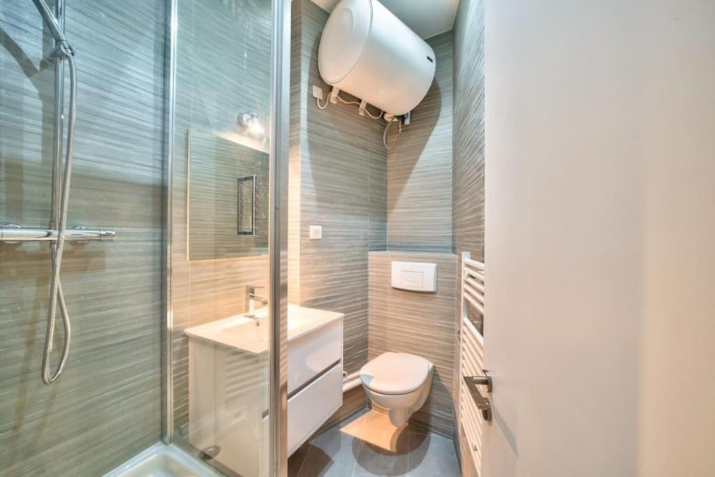 Bel Appartement Au Coeur De Montmartre ปารีส ภายนอก รูปภาพ